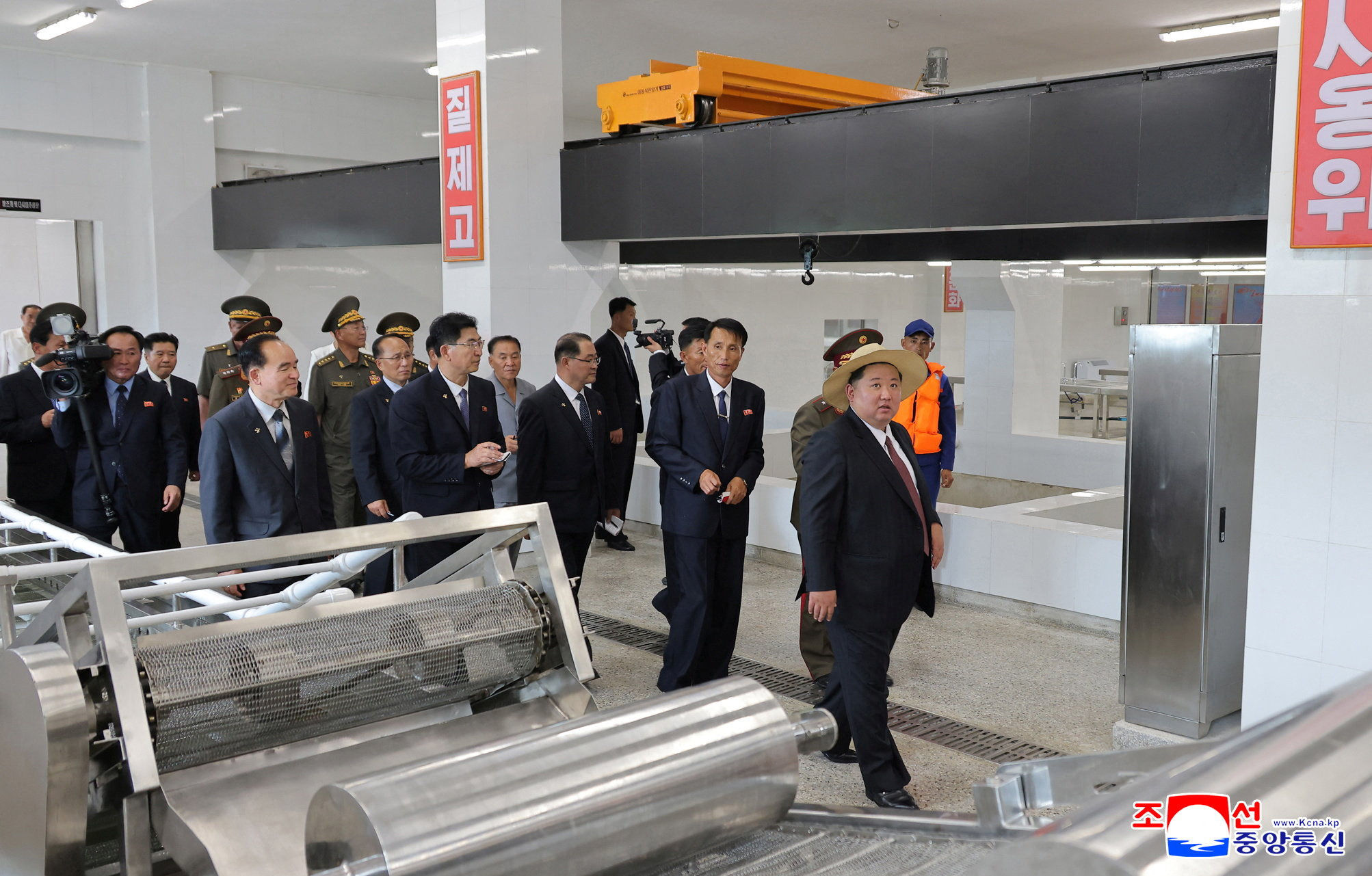 North Korean leader Kim Jong Un attends the inauguration ceremony of Ragwon County Offshore Farm