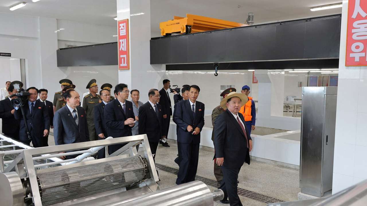 North Korean leader Kim Jong Un attends the inauguration ceremony of Ragwon County Offshore Farm