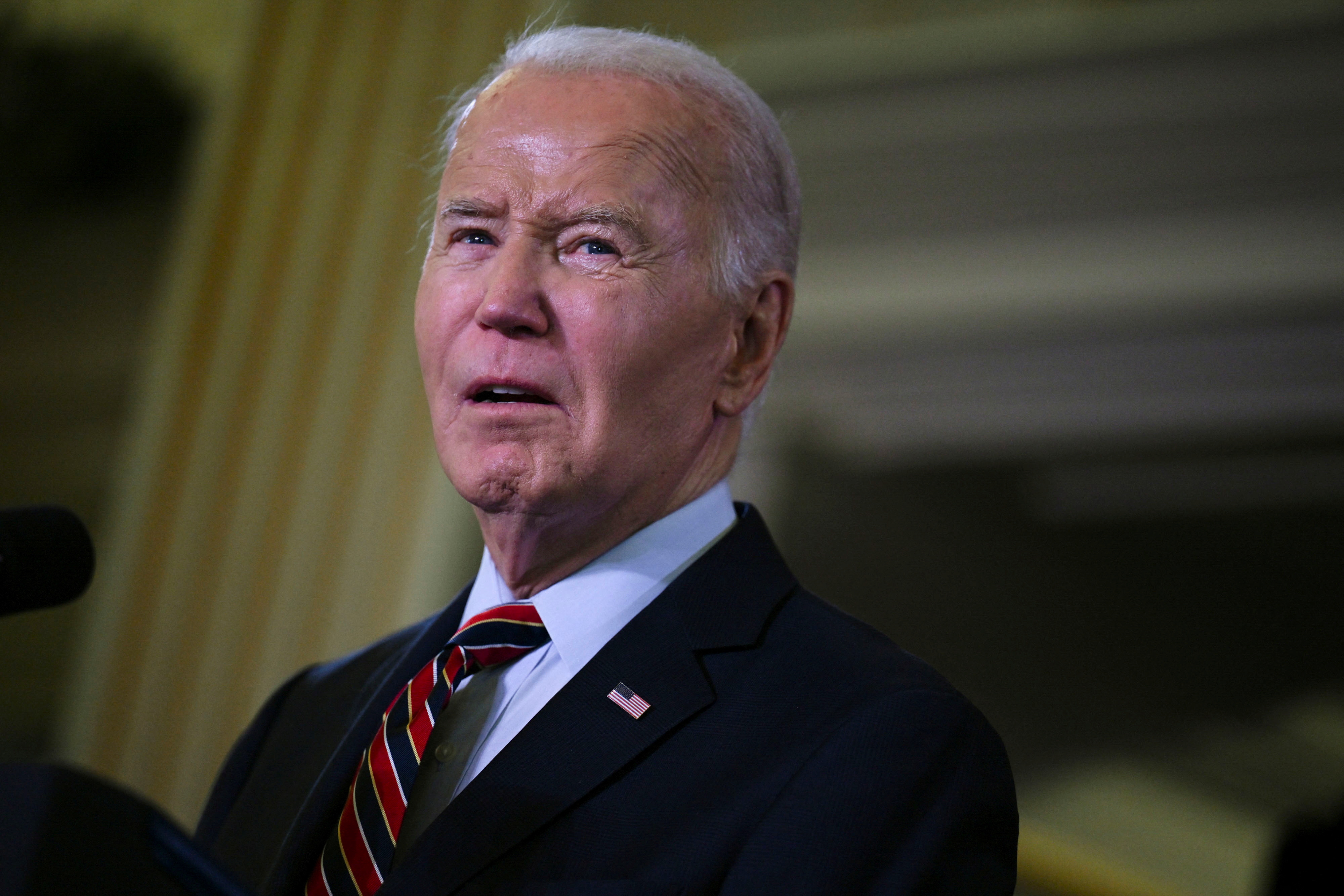U.S. President Biden delivers remarks at the Democratic National Committee's Holiday Reception