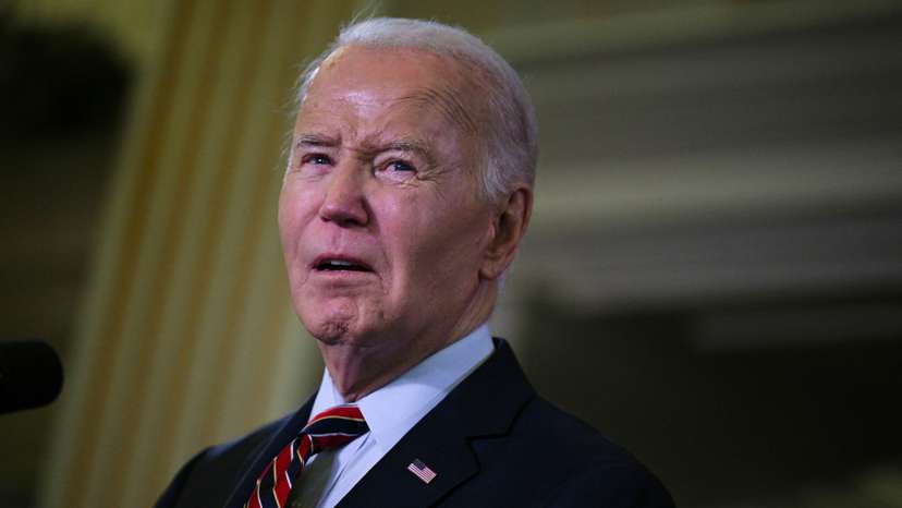 U.S. President Biden delivers remarks at the Democratic National Committee's Holiday Reception