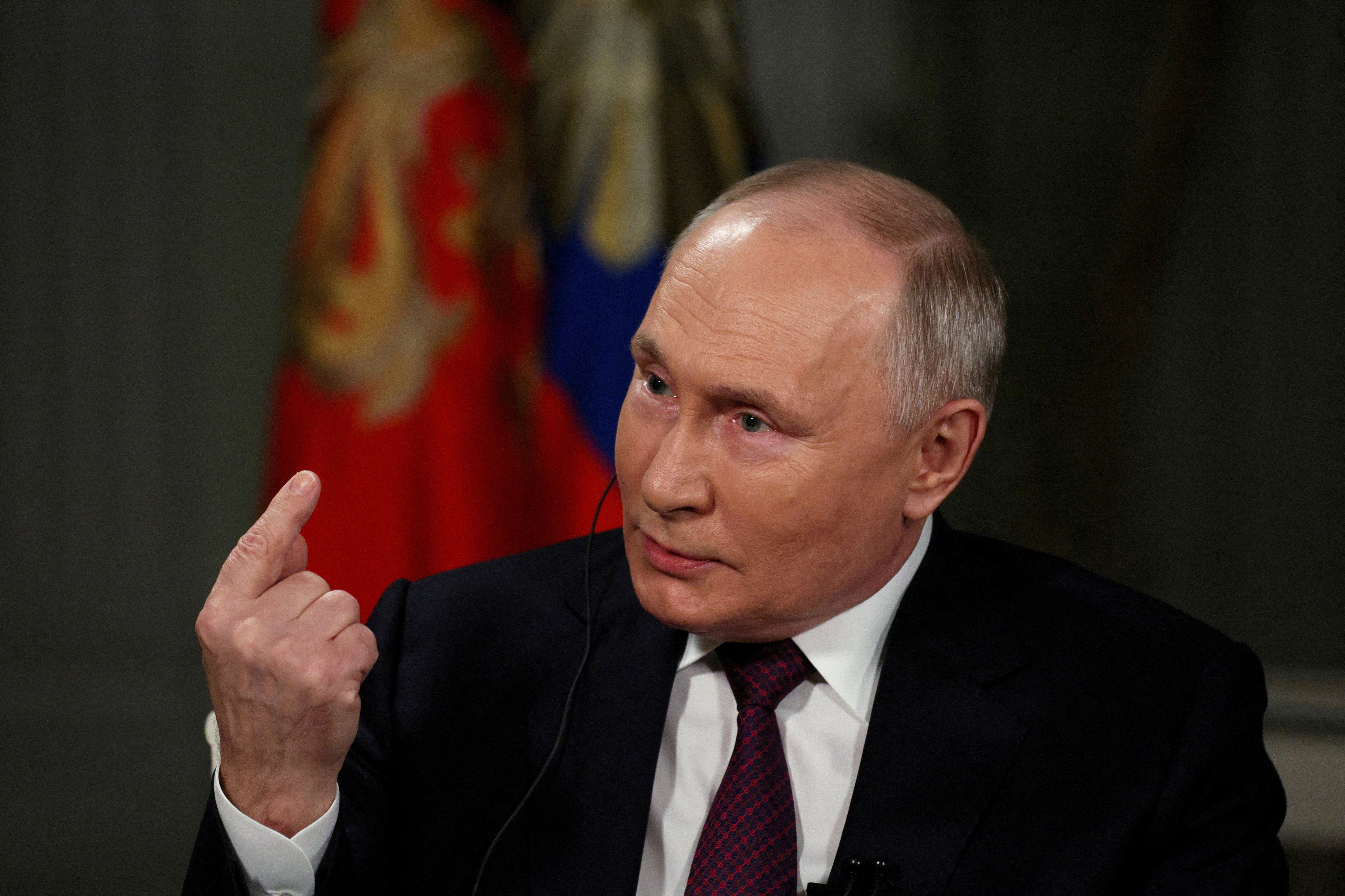 FILE PHOTO: Russian President Vladimir Putin gives interview to U.S. television host Tucker Carlson in Moscow