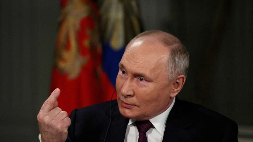 FILE PHOTO: Russian President Vladimir Putin gives interview to U.S. television host Tucker Carlson in Moscow