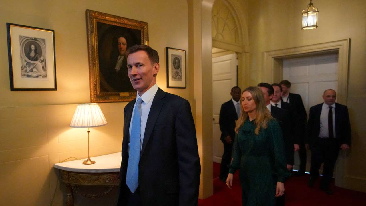 Britain's Chancellor of the Exchequer Hunt leaves 11 Downing Street to present budget to parliament, in London