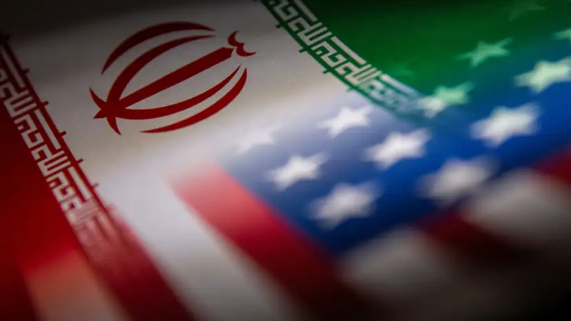 Illustration shows Iran's and U.S.' flags