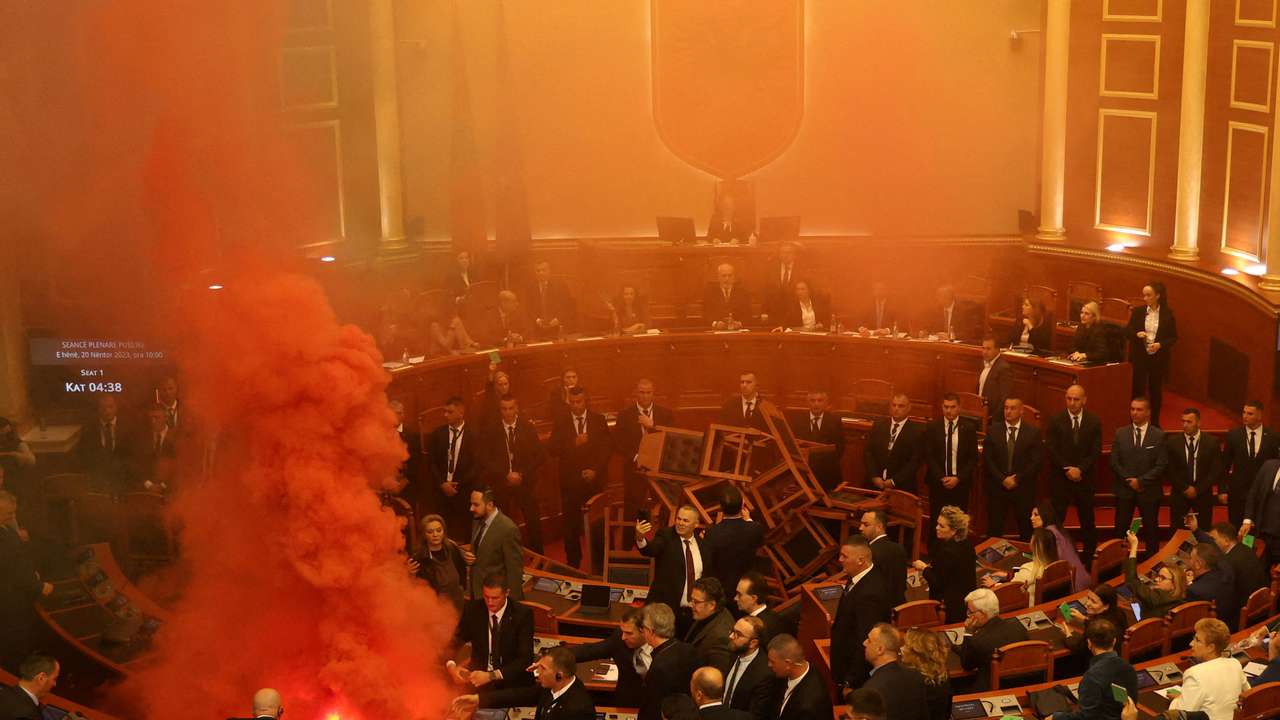 MP of Democratic Party light coloured smoke bomb in Tirana