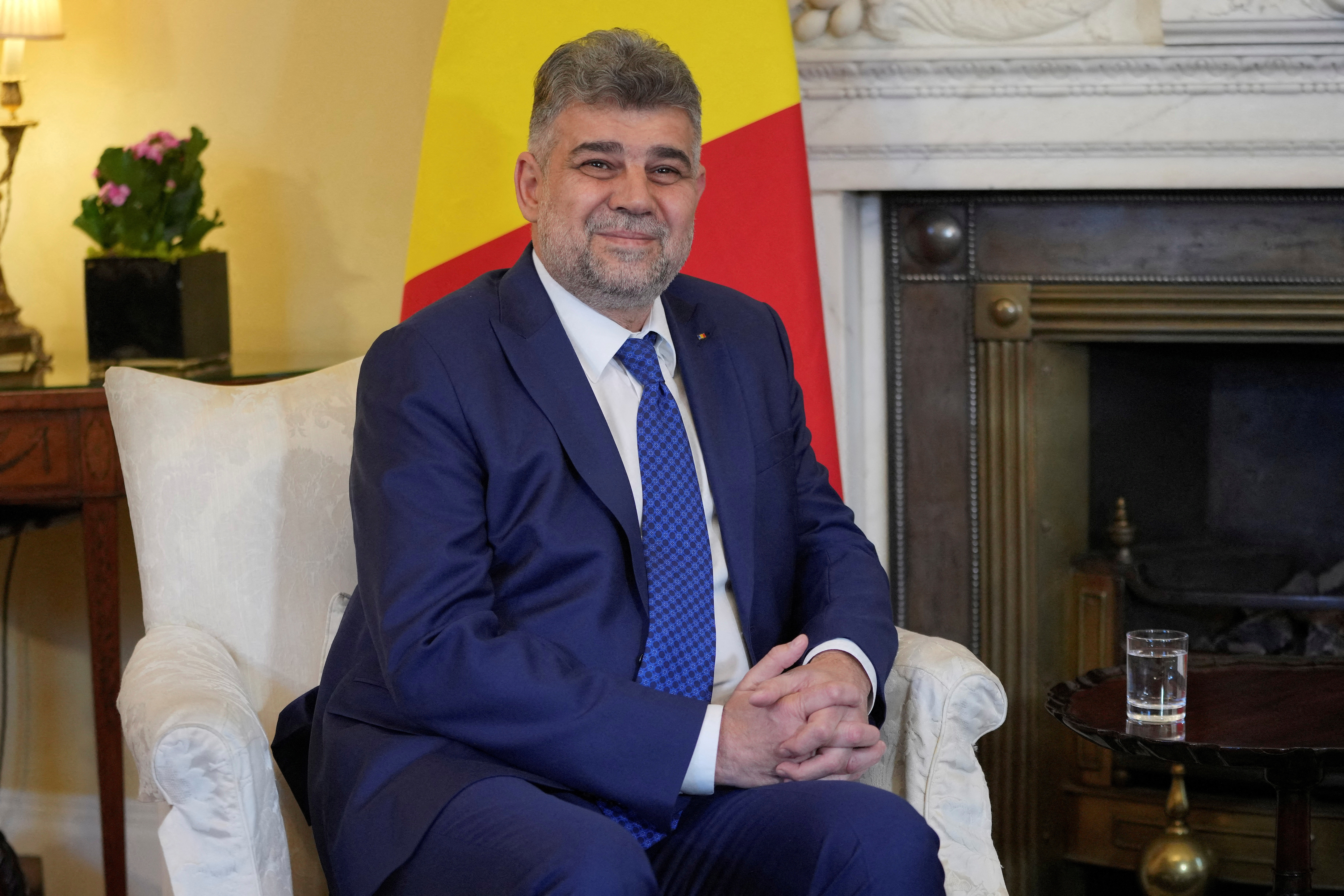 FILE PHOTO: Romania's PM Ciolacu visits Britain