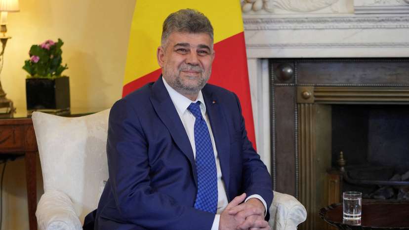 FILE PHOTO: Romania's PM Ciolacu visits Britain