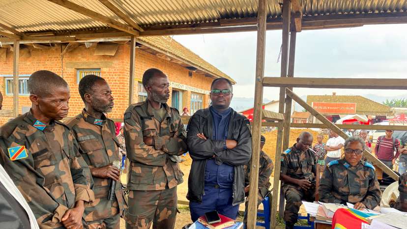 Group of Congolese soldiers, accused of fleeing combat against M23 rebels, take part in their trial, in Lubero