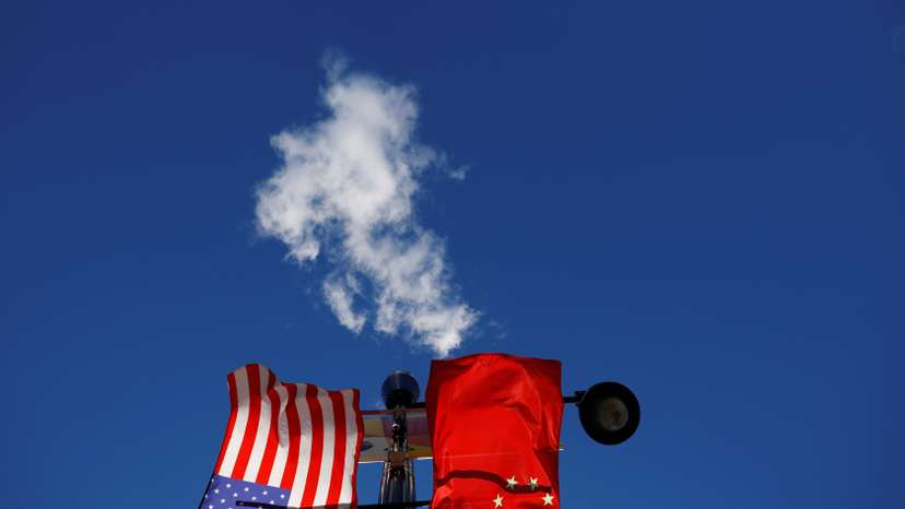 The flags of the United States and China fly in Boston