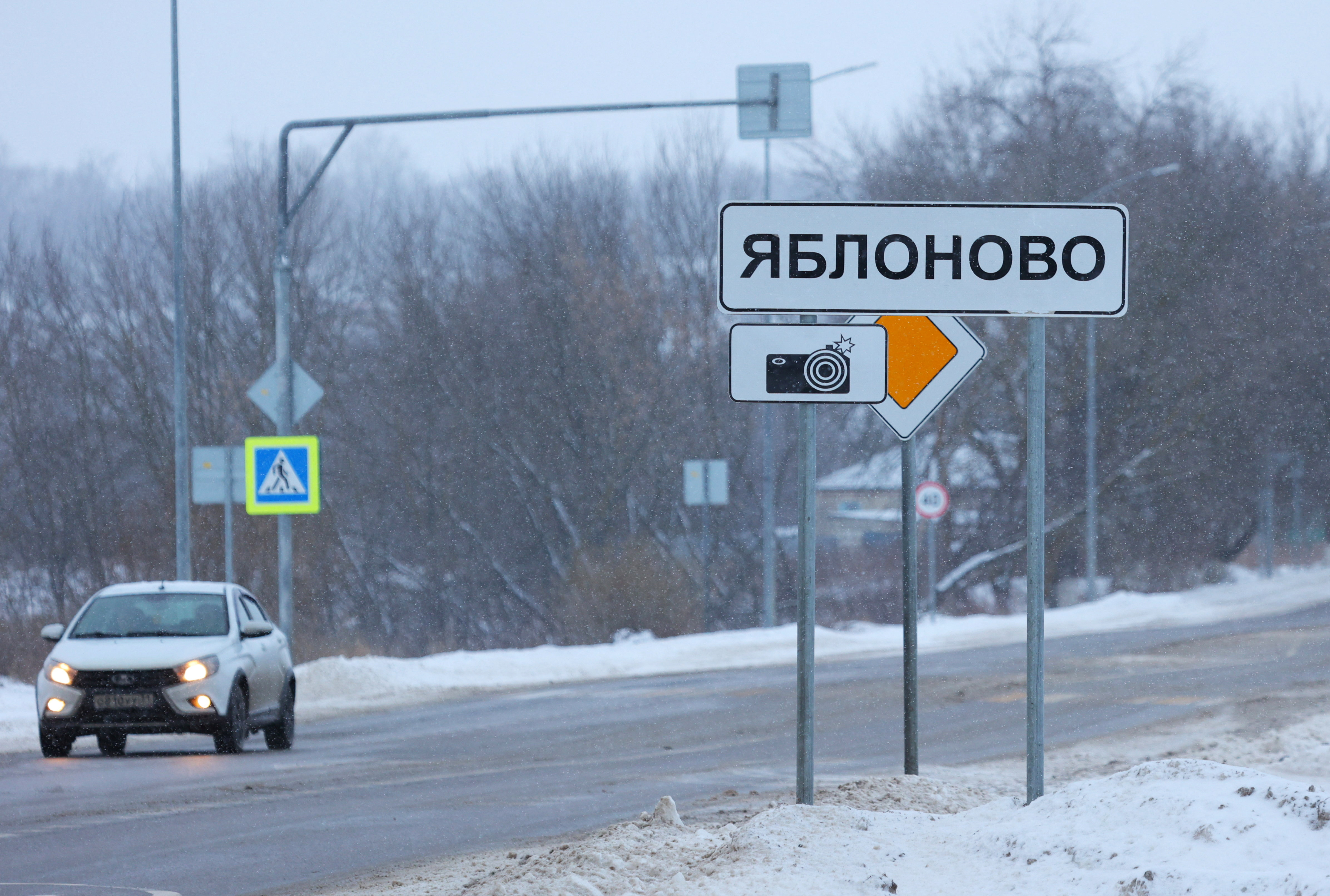 A view shows a road sign with the name of Yablonovo village near the crash site of the Russian Ilyushin Il-76 military transport plane in Belgorod Region