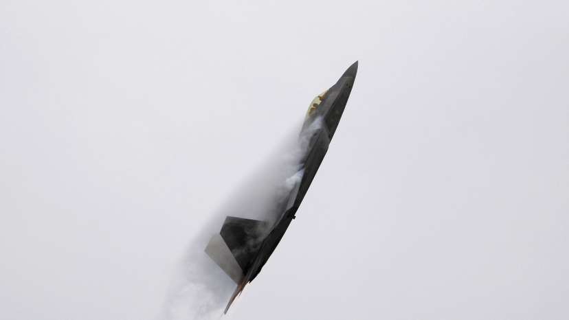 FILE PHOTO: An F-22 Raptor fighter jet performs maneuvers during the California International Airshow in Salinas