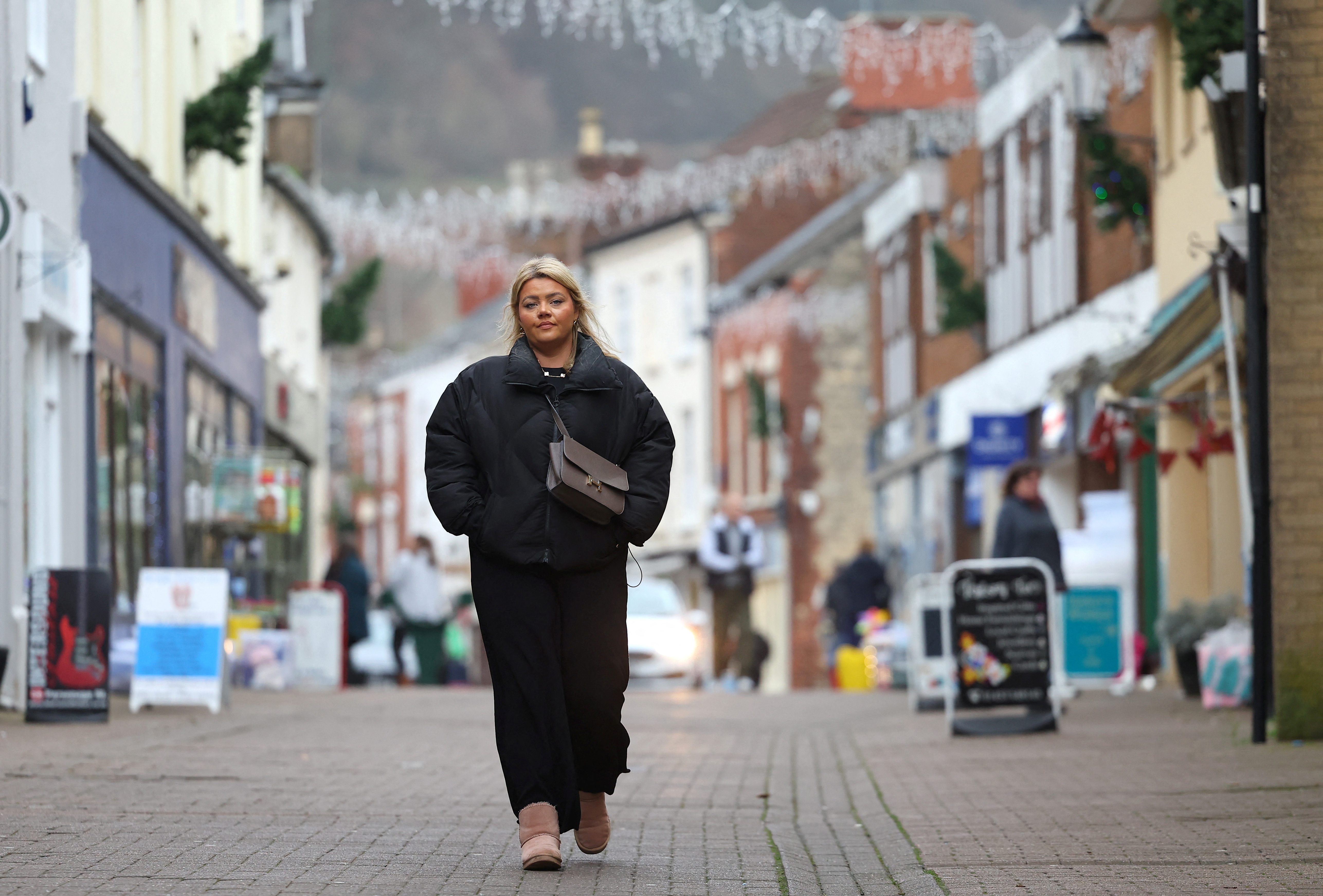 Kaya walks following an interview with Reuters, in Dursley