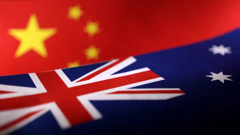 Illustration shows printed Chinese and Australian flags