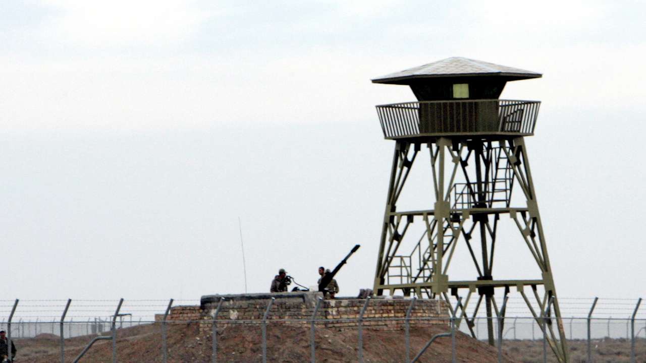 FILE PHOTO: Iranian soldiers stand guard inside Natanz uranium enrichment facility