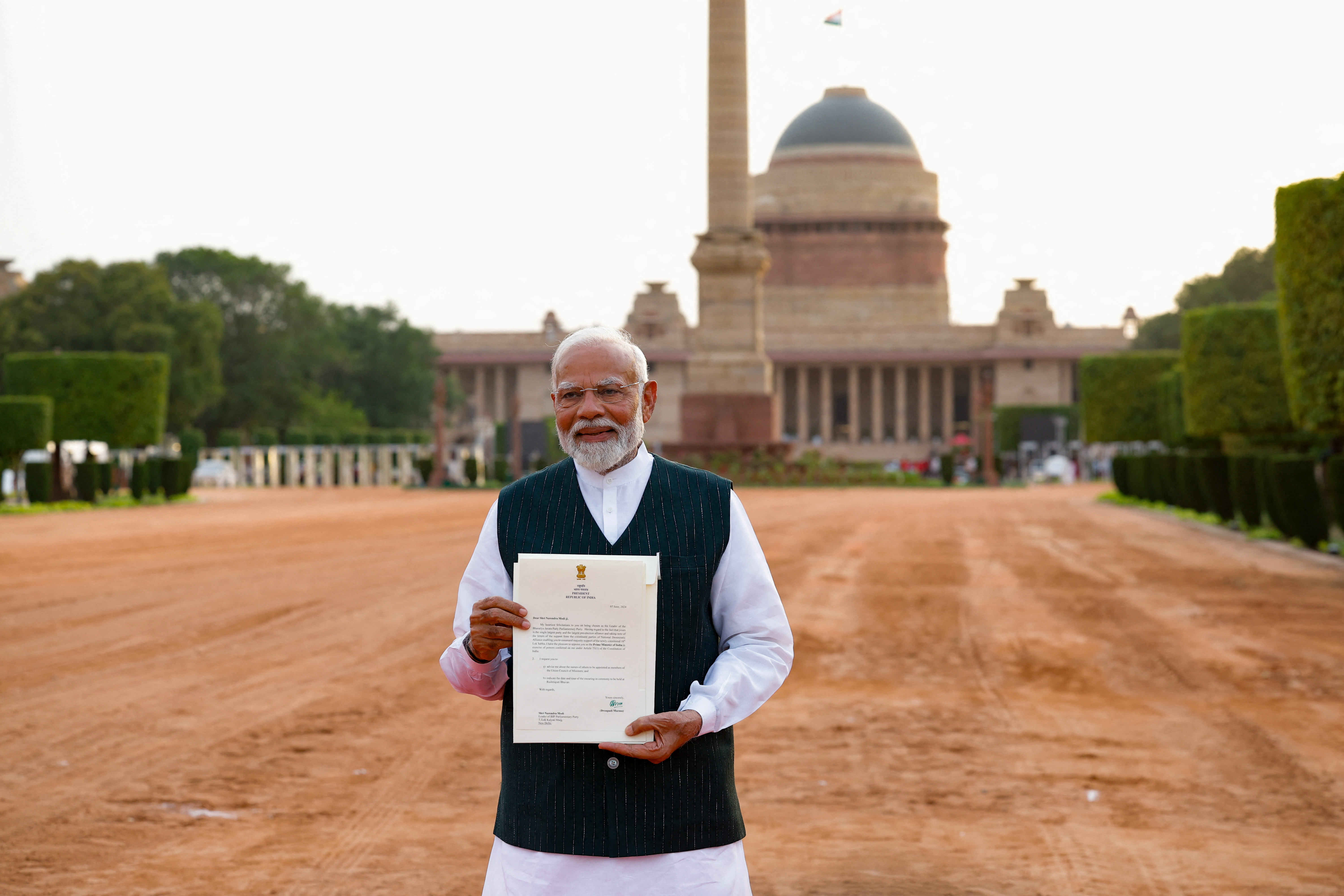 India's Prime Minister Narendra Modi addresses the media after his meeting with President Droupadi Murmu