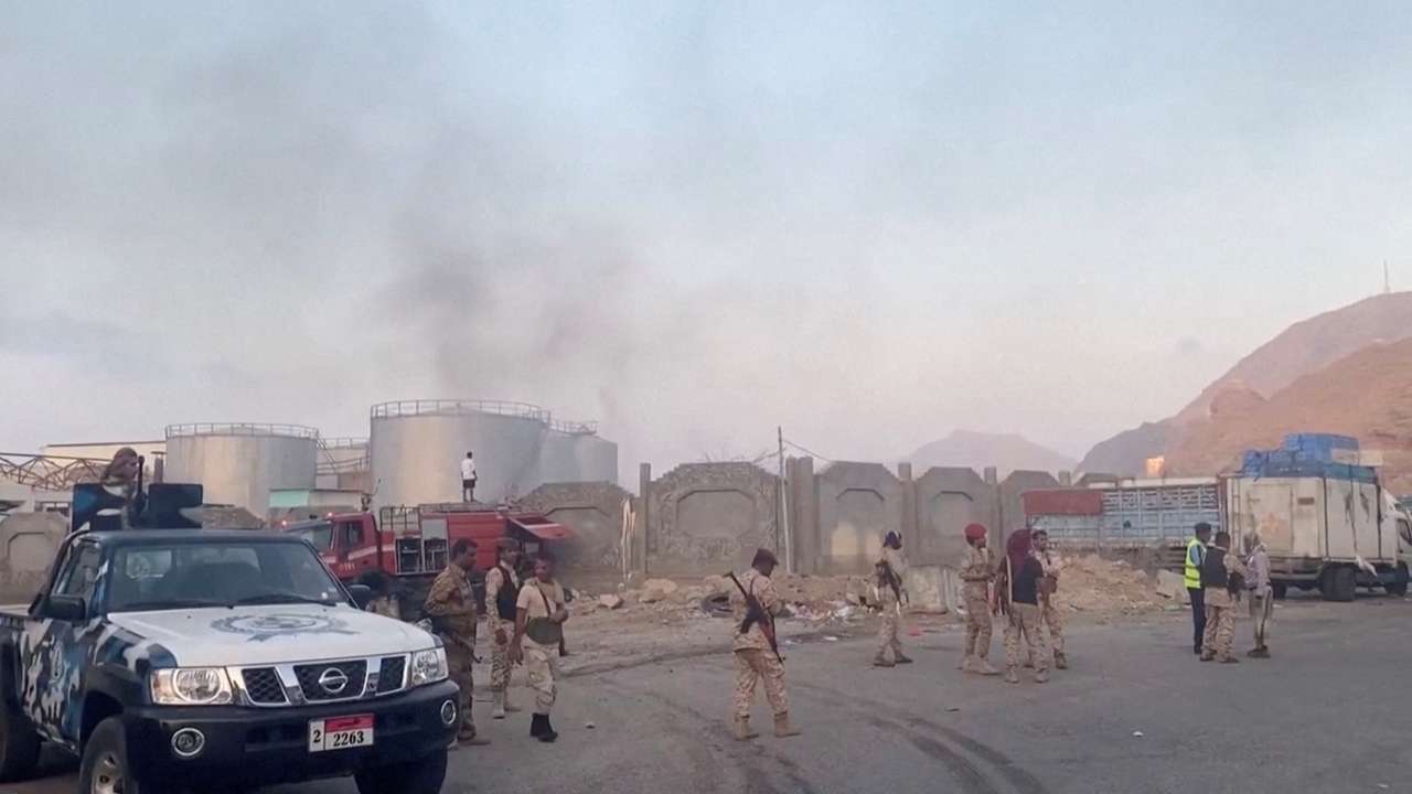 Smoke rises in Yemeni port of Mukalla following Saudi-led coalition strike on military shipments