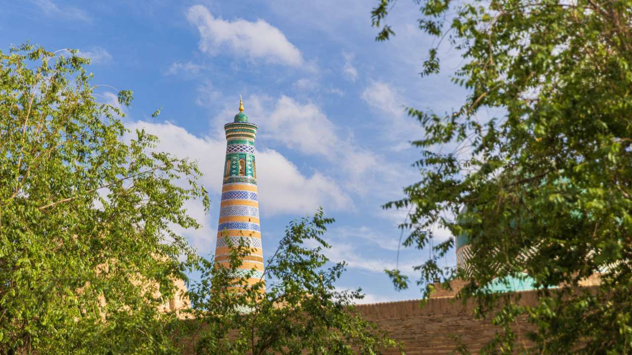 Islam Khodja Minaret at the Itchan Kala, the walled inner town of the city of Khiva in Uzbekistan Islam Khodja Minaret a