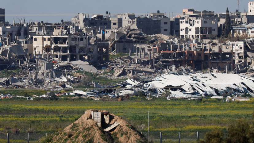 A view of damaged buildings in the Gaza Strip, as seen from southern Israel