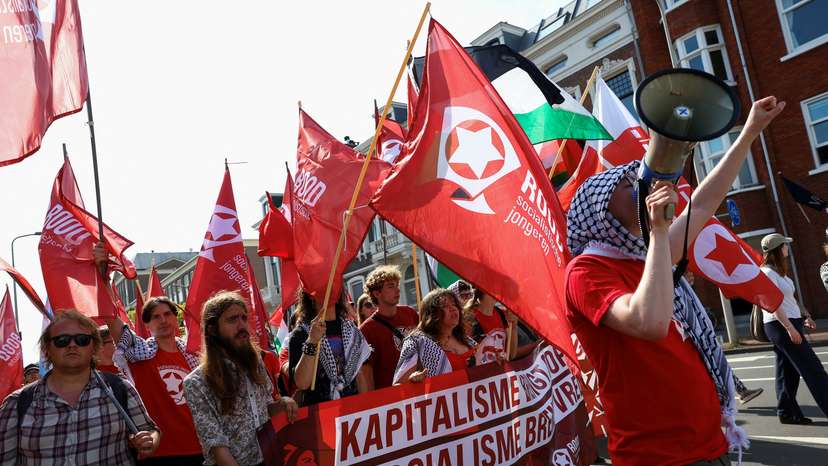 Demonstrators march against the upcoming NATO leaders' summit at The Hague