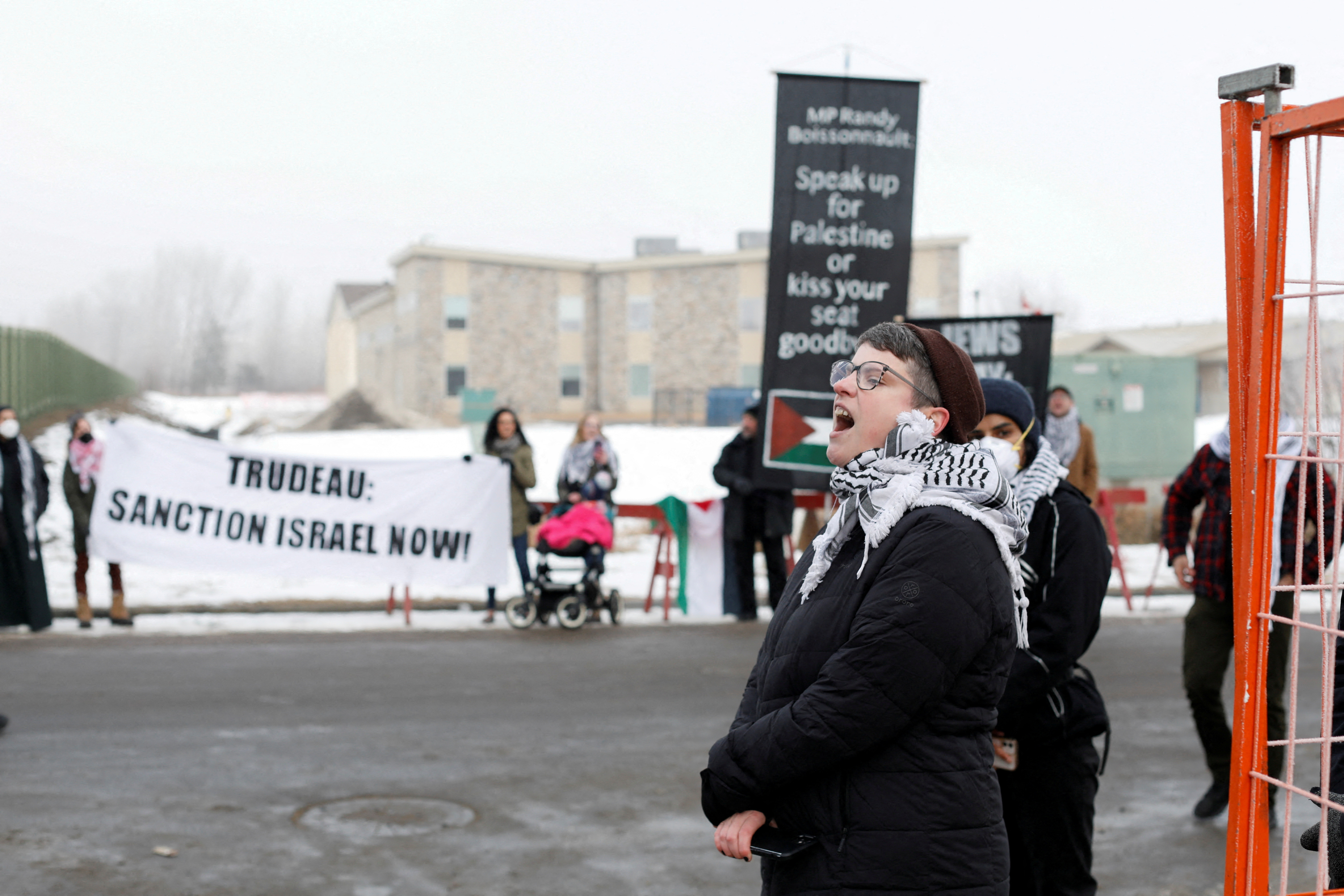 FILE PHOTO: Protest as Canada’s Prime Minister Trudeau visits Edgemont Flats housing complex in Edmonton