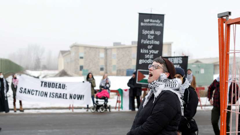 FILE PHOTO: Protest as Canada’s Prime Minister Trudeau visits Edgemont Flats housing complex in Edmonton