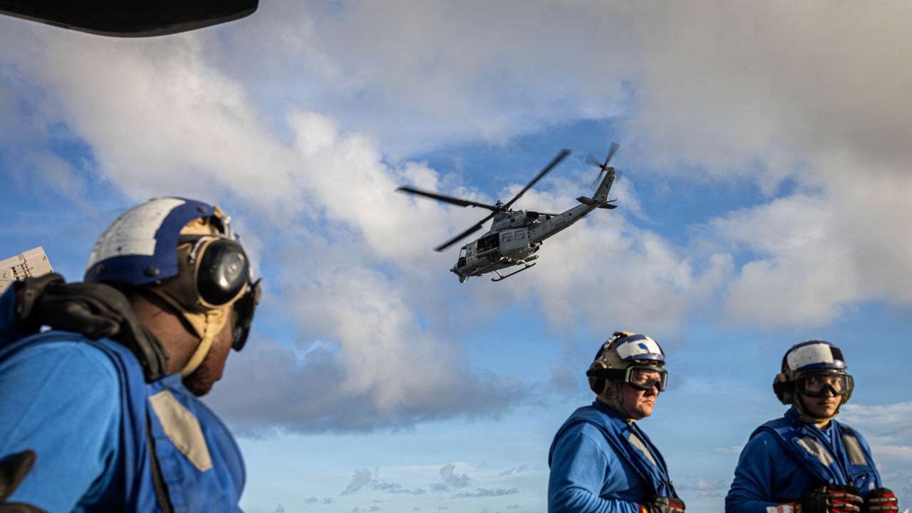U.S. Marines UH-1Y Venom helicopter takes off in the Caribbean Sea