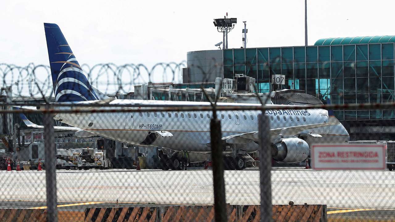 FILE PHOTO: A Copa Airlines plane sits in the tarmac is pictured at Tocumen International Airport in Panama City