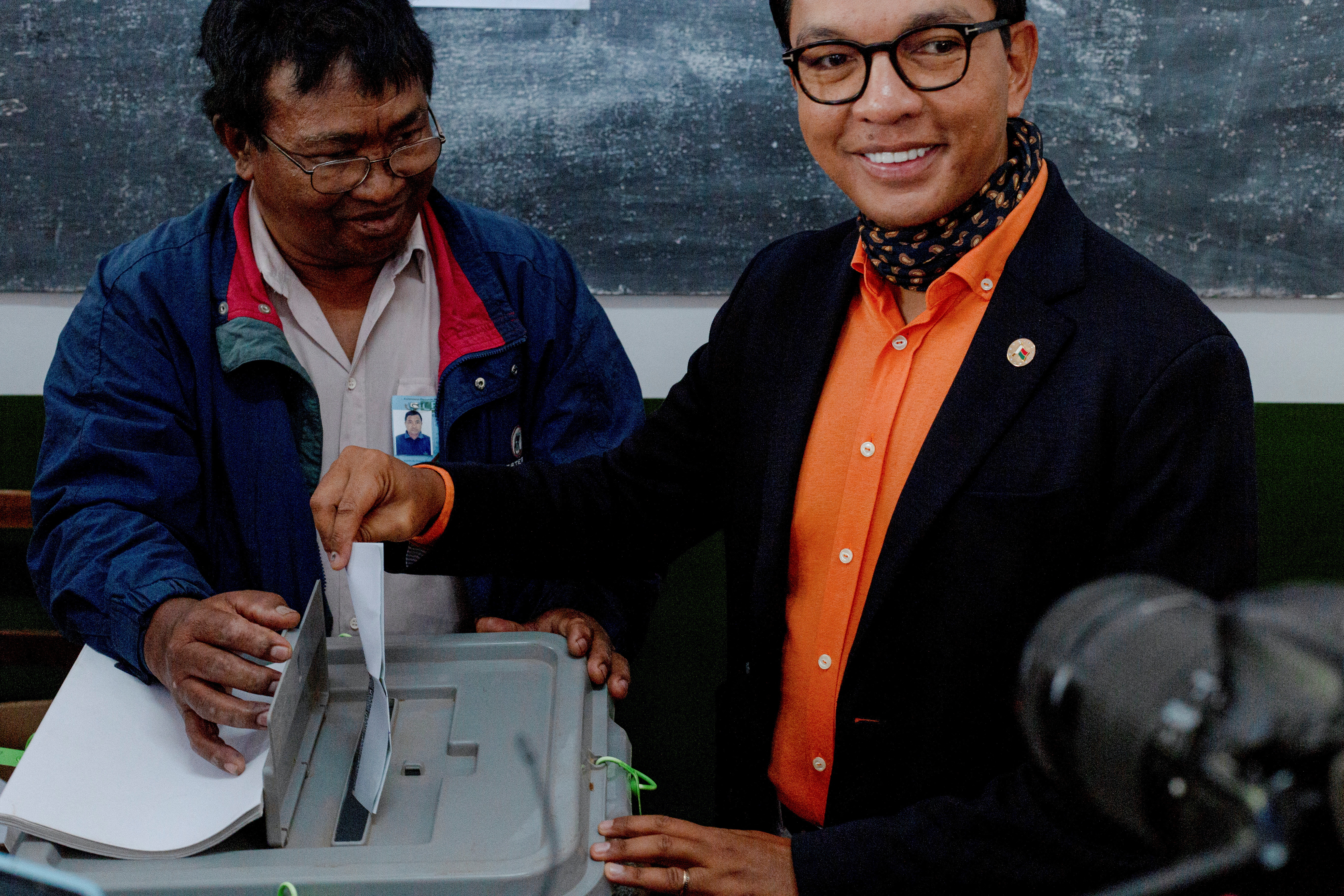 Madagascar's President and a presidential candidate Andry Rajoelina casts his ballot at a polling station during the presidential election in Ambatobe