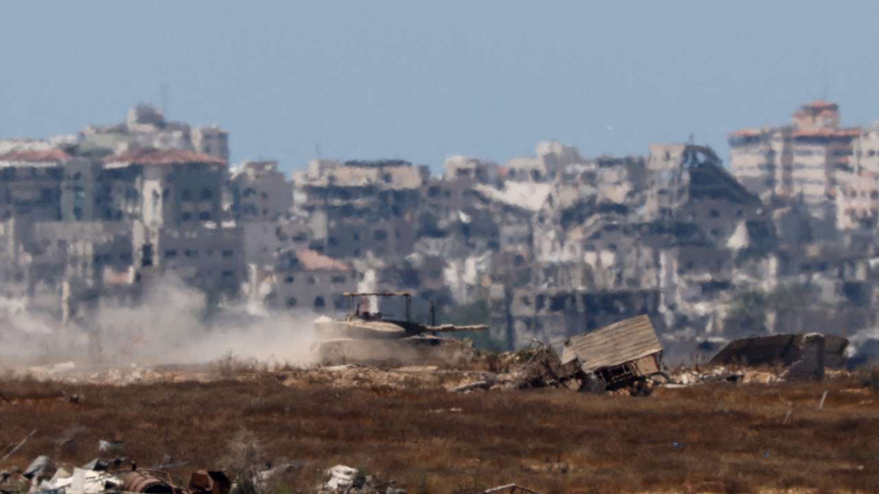 FILE PHOTO: An Israeli tank manoeuvres inside the Gaza Strip