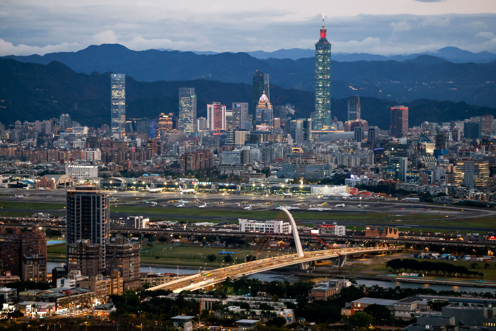 A general view shows Taipei city skyline, including the Taipei 101 skyscraper, with Songshan Airport in the foreground in Taipei