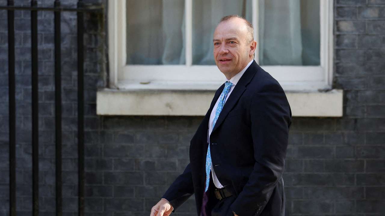 FILE PHOTO: Britian's Northern Ireland minister Chris Heaton-Harris at Downing Street in London