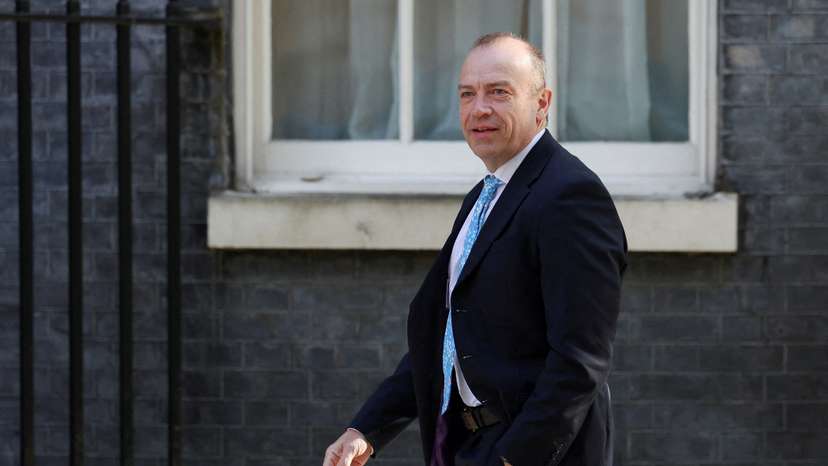 FILE PHOTO: Britian's Northern Ireland minister Chris Heaton-Harris at Downing Street in London