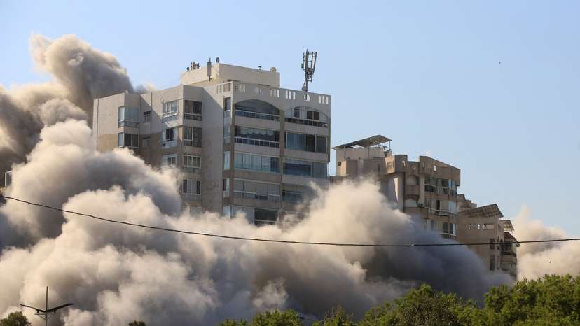 Smoke rises after an Israeli strike on a building in Tayouneh neighborhood in Beirut