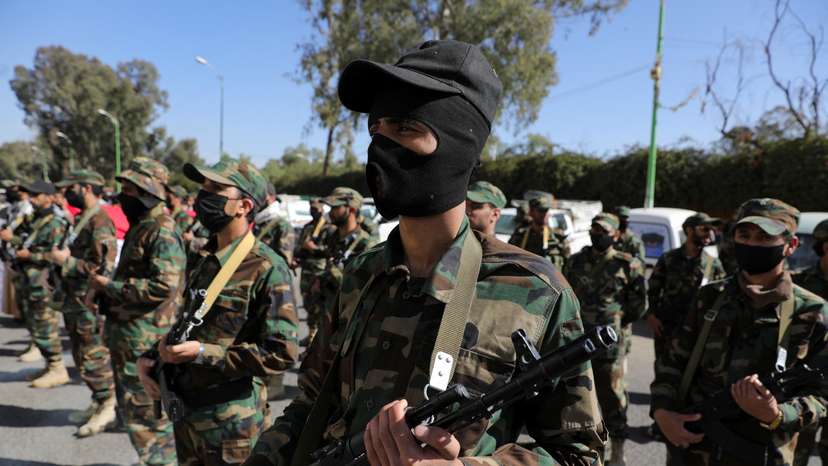 Houthi mobilization trainees parade in Sanaa