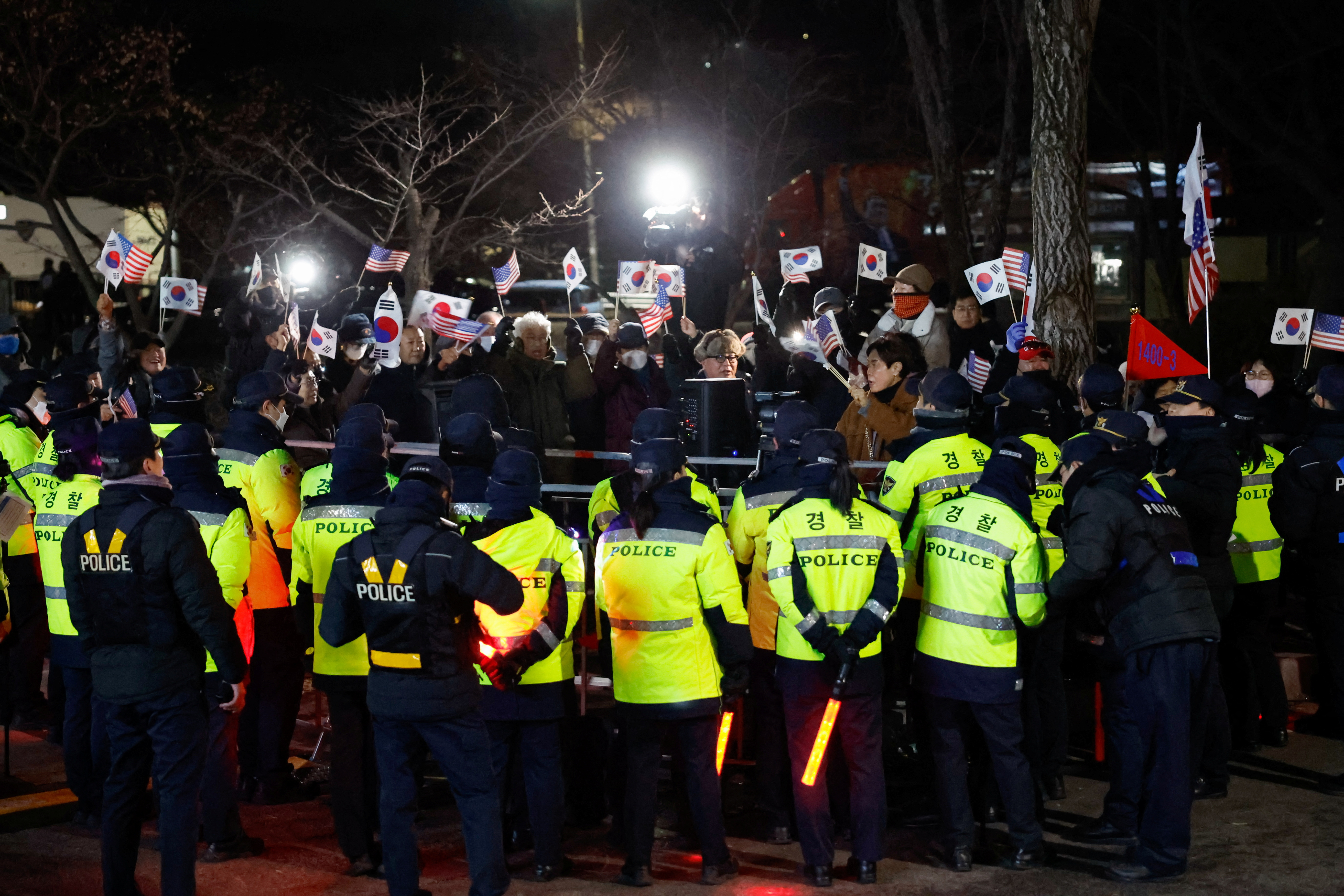 Scenes from outside the Seoul Detention Center in Uiwang