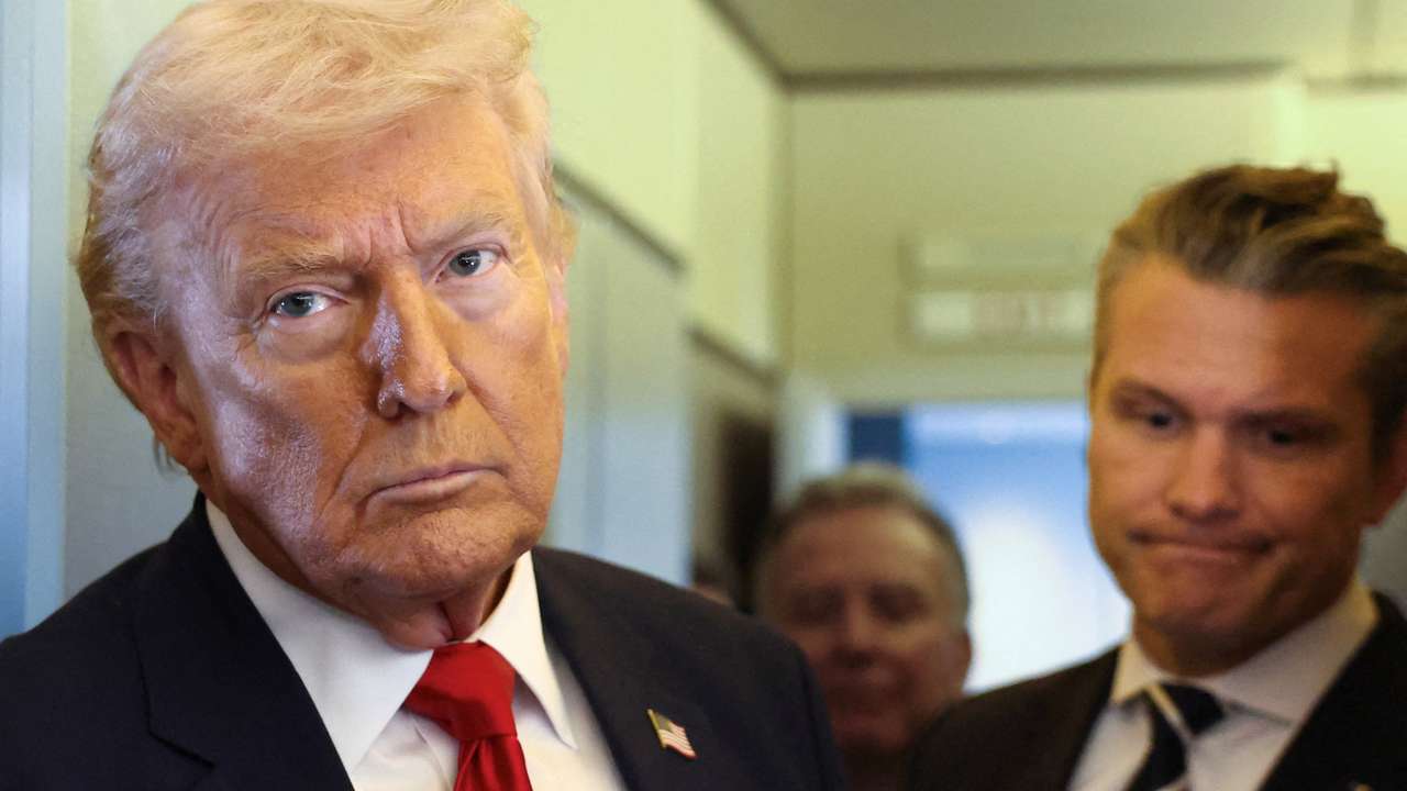 Trump speaks to reporters aboard Air Force One