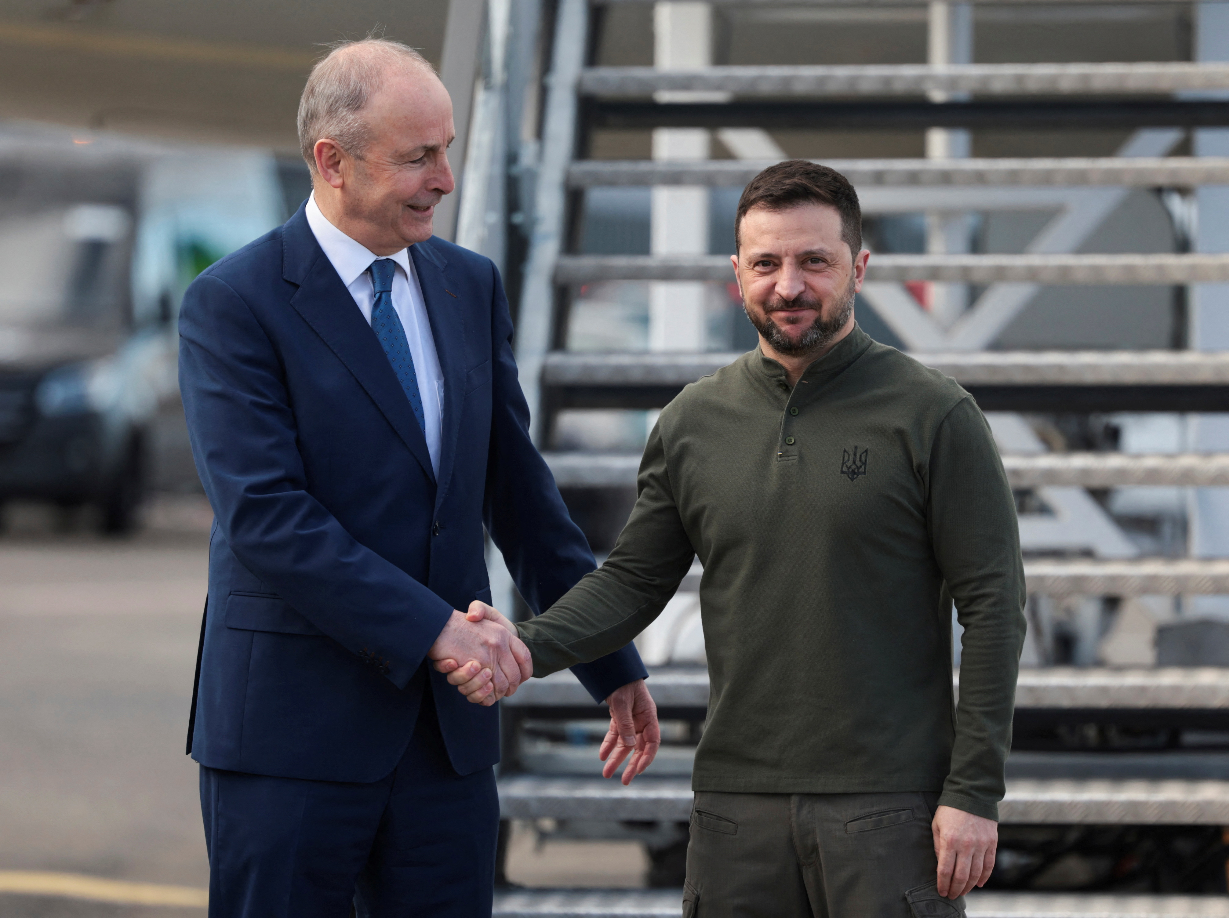 Ireland's Taoiseach (Prime Minister) Micheal Martin greets Ukraine's President Volodymyr Zelenskiy at Shannon airport