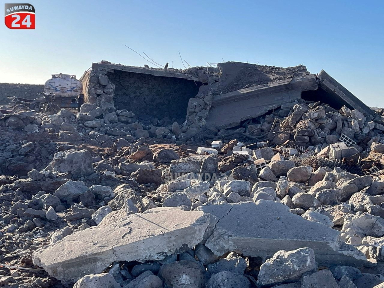 Aftermath of suspected Jordanian airstrike on what is given as Sweida