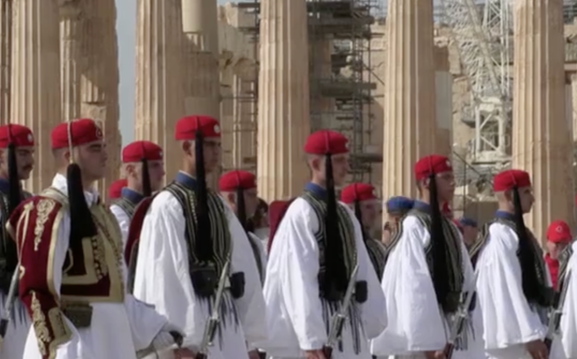 The anniversary event, which featured a ceremony by the Presidential Guard at the Acropolis