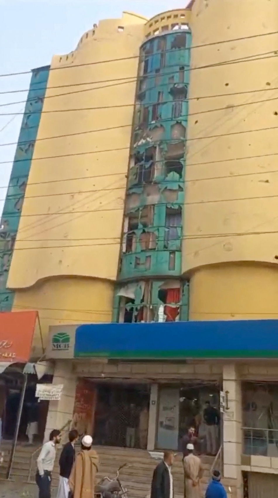 A view shows a building damaged due to an explosion in Peshawar