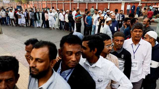 Voters stand in the queue to cast their vote at a polling station during the 13th general election in Dhaka, Bangladesh, February 12, 2026. REUTERS/Mohammad Ponir Hossain