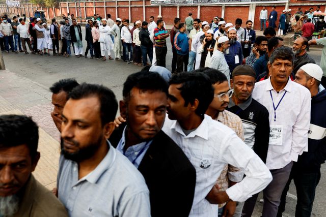 Voters stand in the queue to cast their vote at a polling station during the 13th general election in Dhaka, Bangladesh, February 12, 2026. REUTERS/Mohammad Ponir Hossain