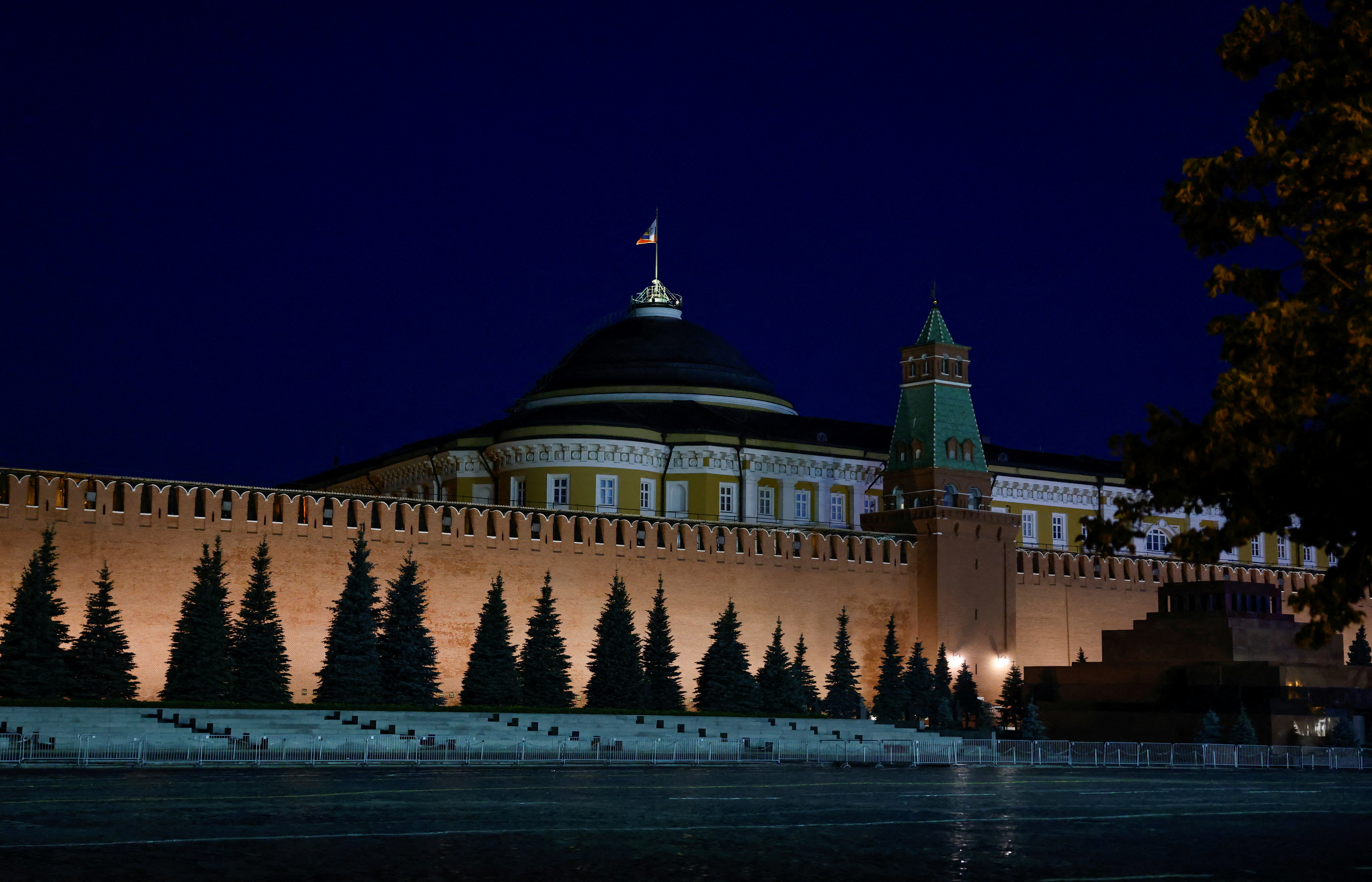 FILE PHOTO: The Russian flag flies on the dome of the Kremlin Senate building in Moscow