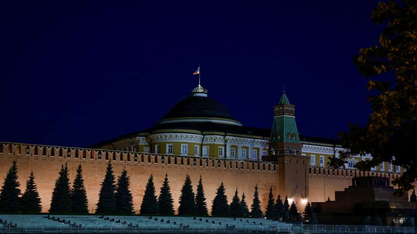 FILE PHOTO: The Russian flag flies on the dome of the Kremlin Senate building in Moscow