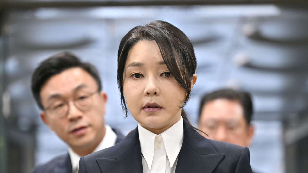 South Korea's former first lady Kim Keon Hee arrives at a court to attend a hearing to review her arrest warrant, in Seoul