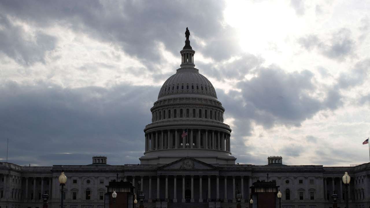 Clouds pass over the U.S. Capitol dome in Washington