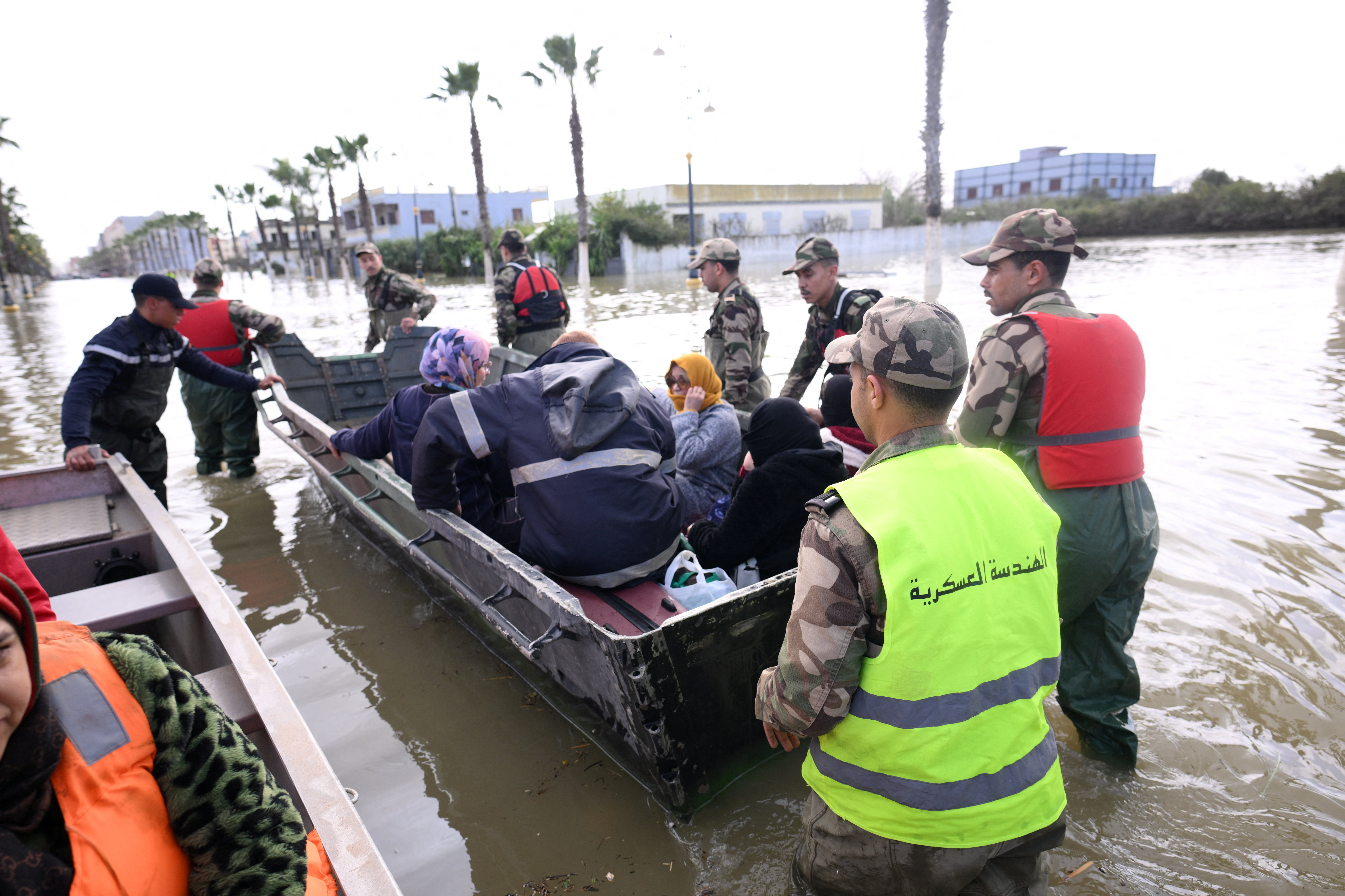 Royal Armed Forces and civil authorities work together to address flooding risks amid rising waters in the Loukkos River, in Ksar El Kebir