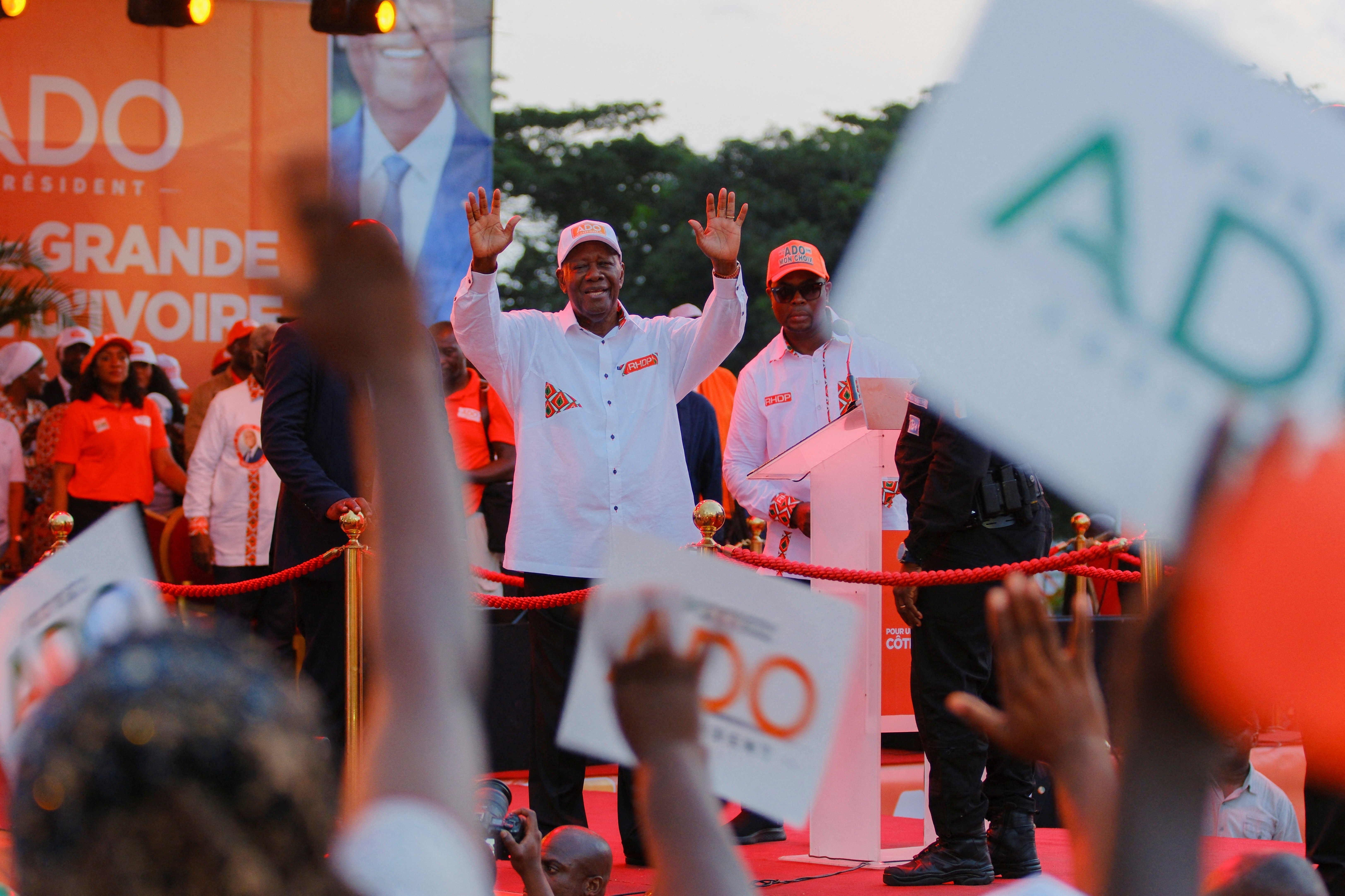 Ivory Coast's President Alassane Ouattara, who is seeking a fourth term, attend his last campaign rally