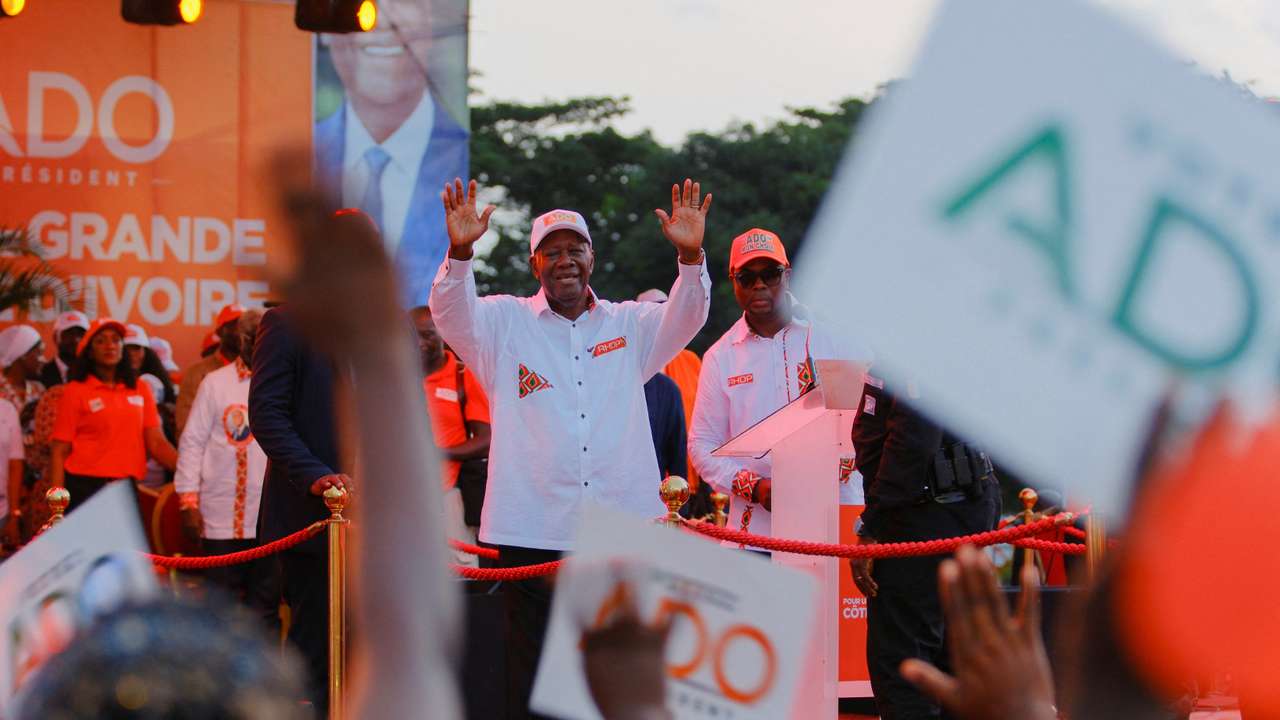 Ivory Coast's President Alassane Ouattara, who is seeking a fourth term, attend his last campaign rally