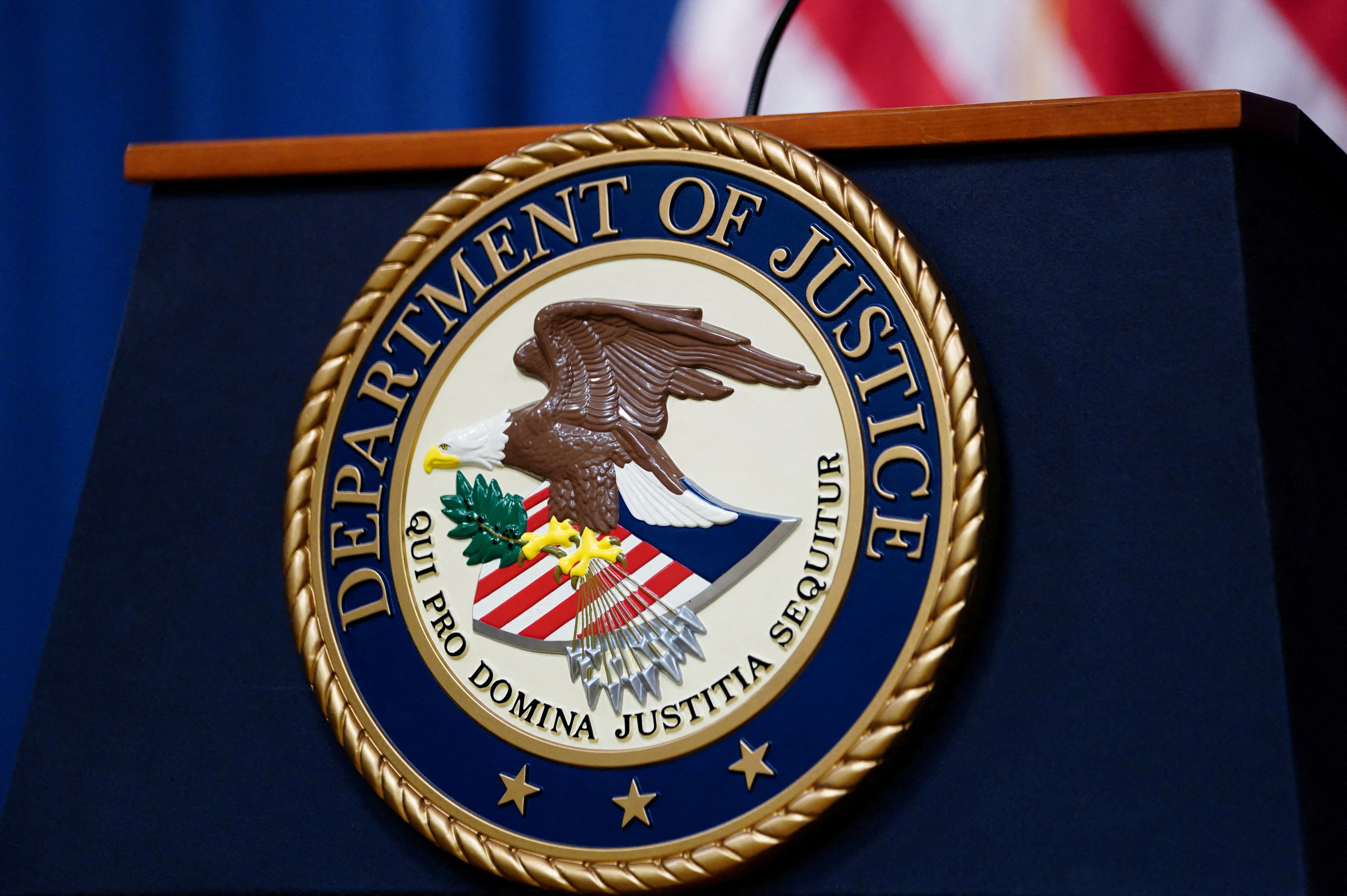 FILE PHOTO: U.S. Justice Department seal is seen at Justice Department headquarters in Washington